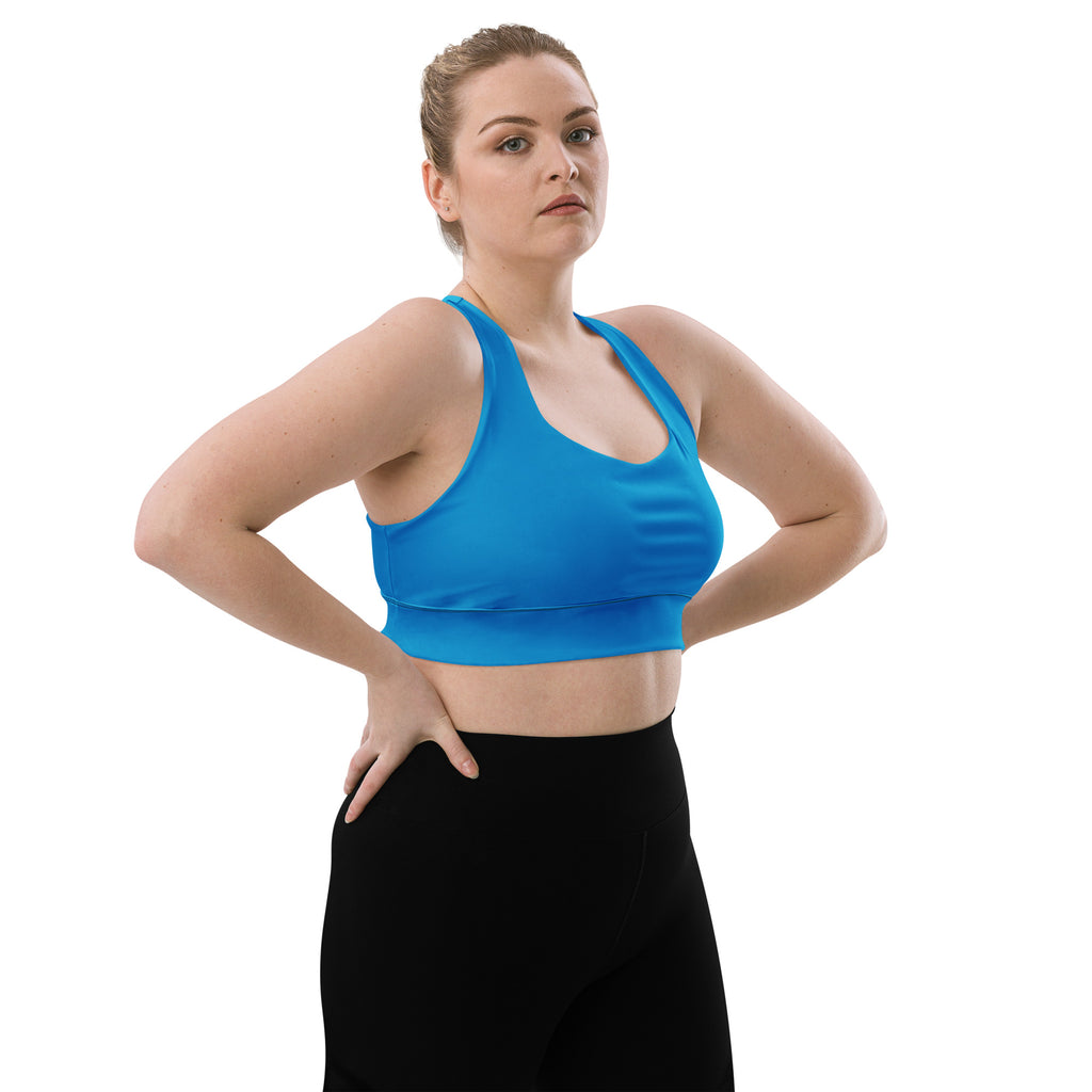 Bright blue seamless recycled sports bra with racerback straps supportive cups quick dry and upf 50 plus for high intensity