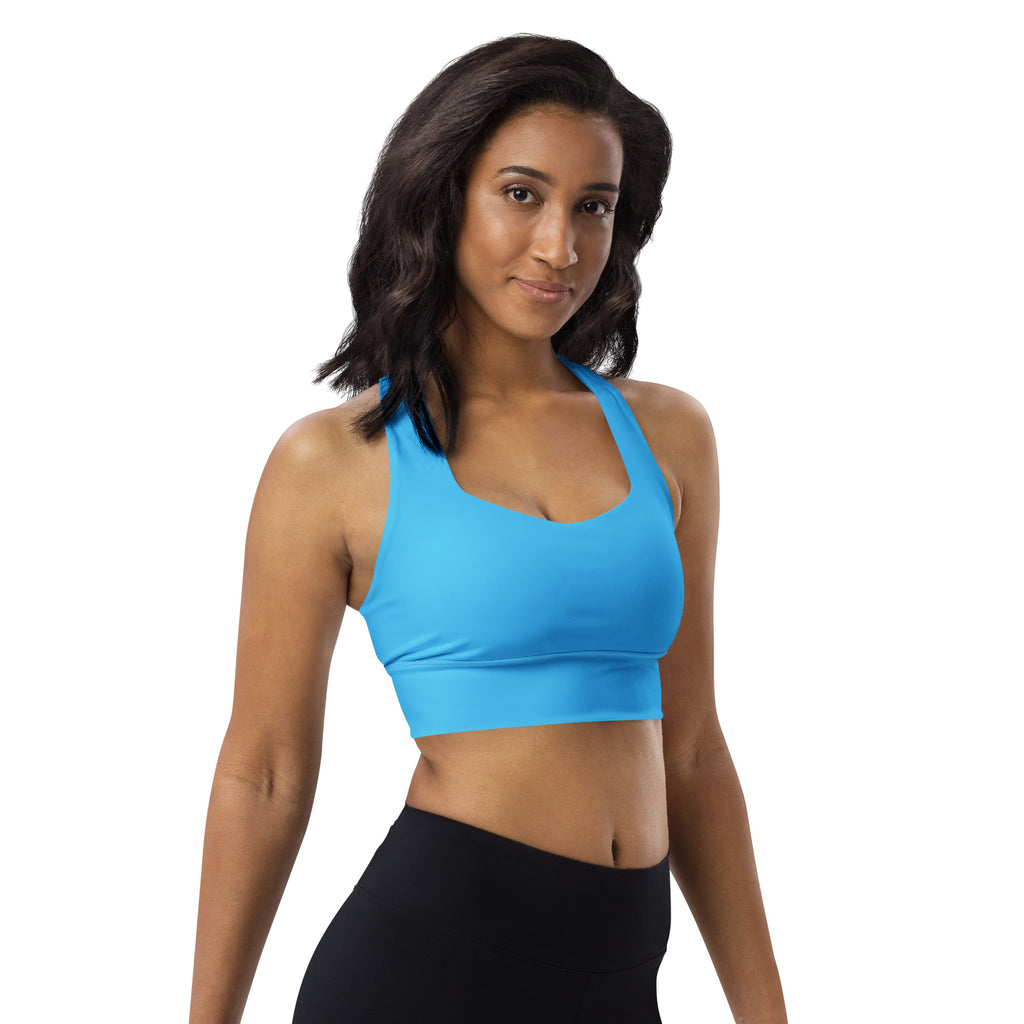 Bright blue form-fitting women’s sports bra with halter neckline supportive band quick dry upf 50+ recycled material