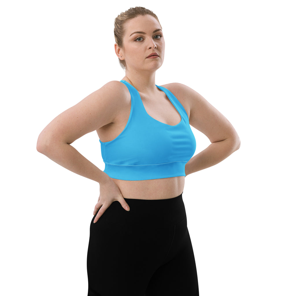 Bright blue seamless womens longline sports bra with racerback straps and high intensity support design