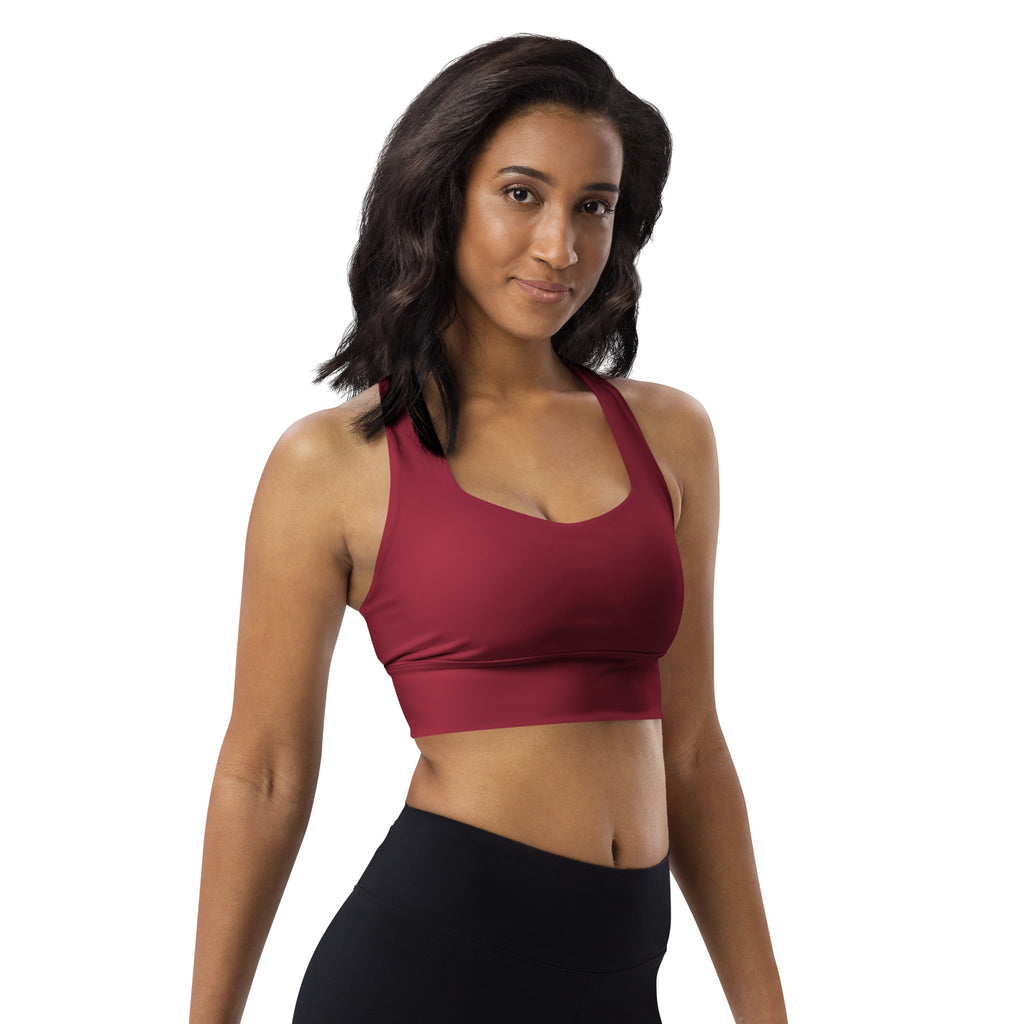 Women’s maroon buttery soft recycled sports bra with scoop neckline racerback and high intensity support