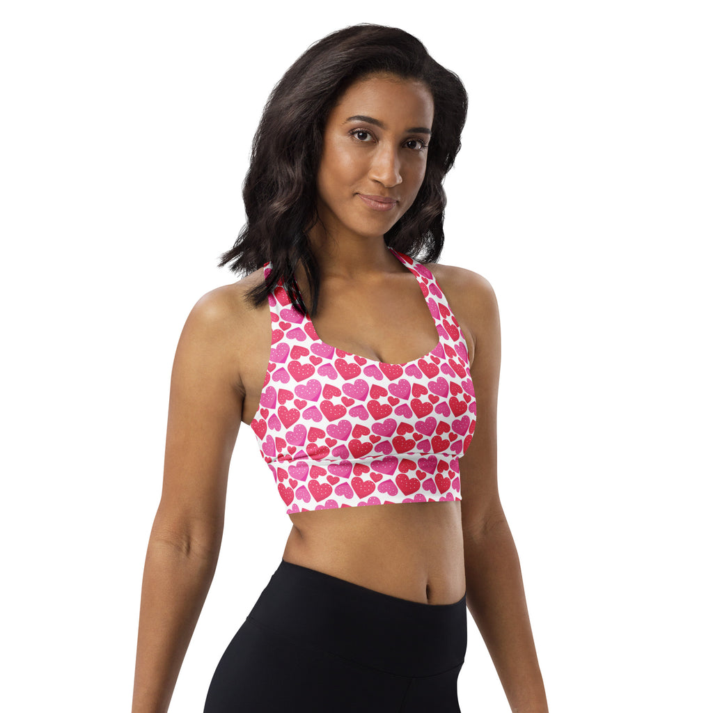 White longline sports bra with pink and red hearts pattern buttery soft recycled fabric high intensity support