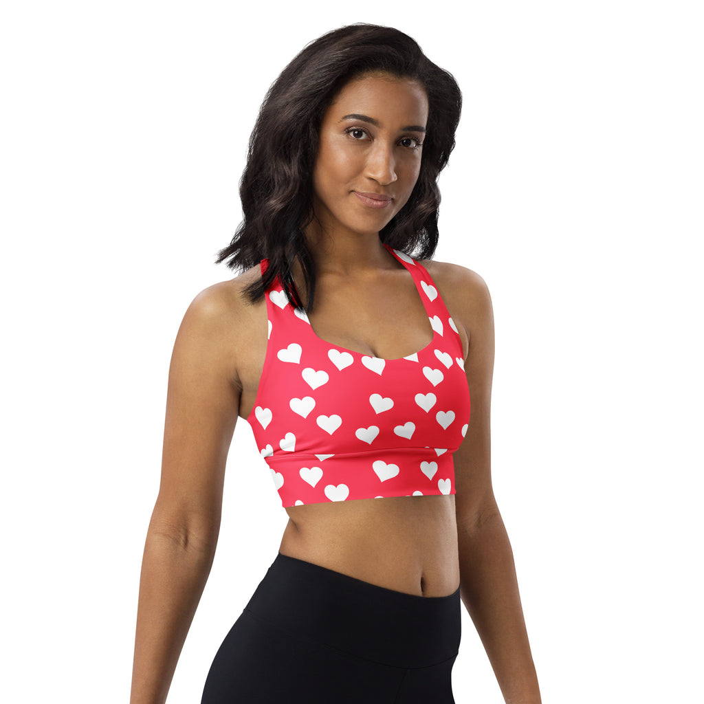 Women’s red longline sports bra with white heart pattern buttery soft recycled fabric high intensity support