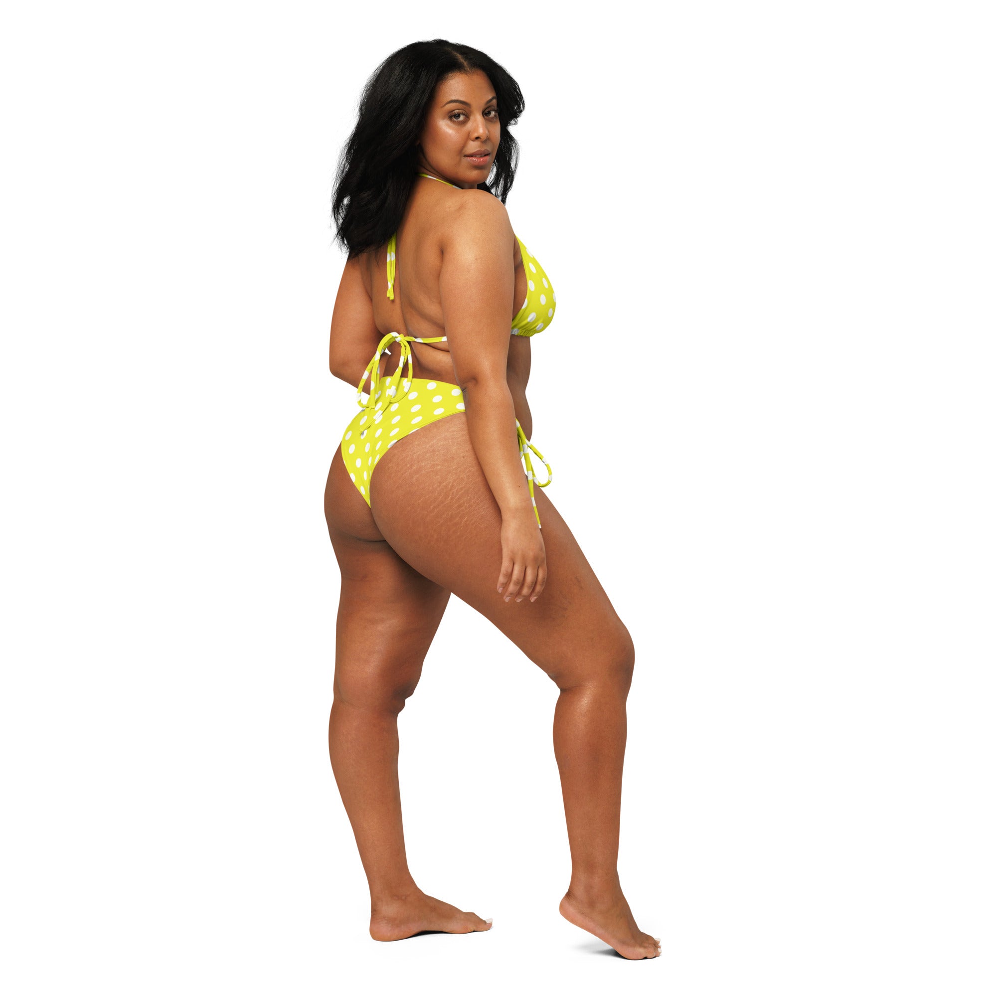Women’s bright yellow buttery soft recycled string bikini with white polka dots and adjustable tie-side straps upf 50+
