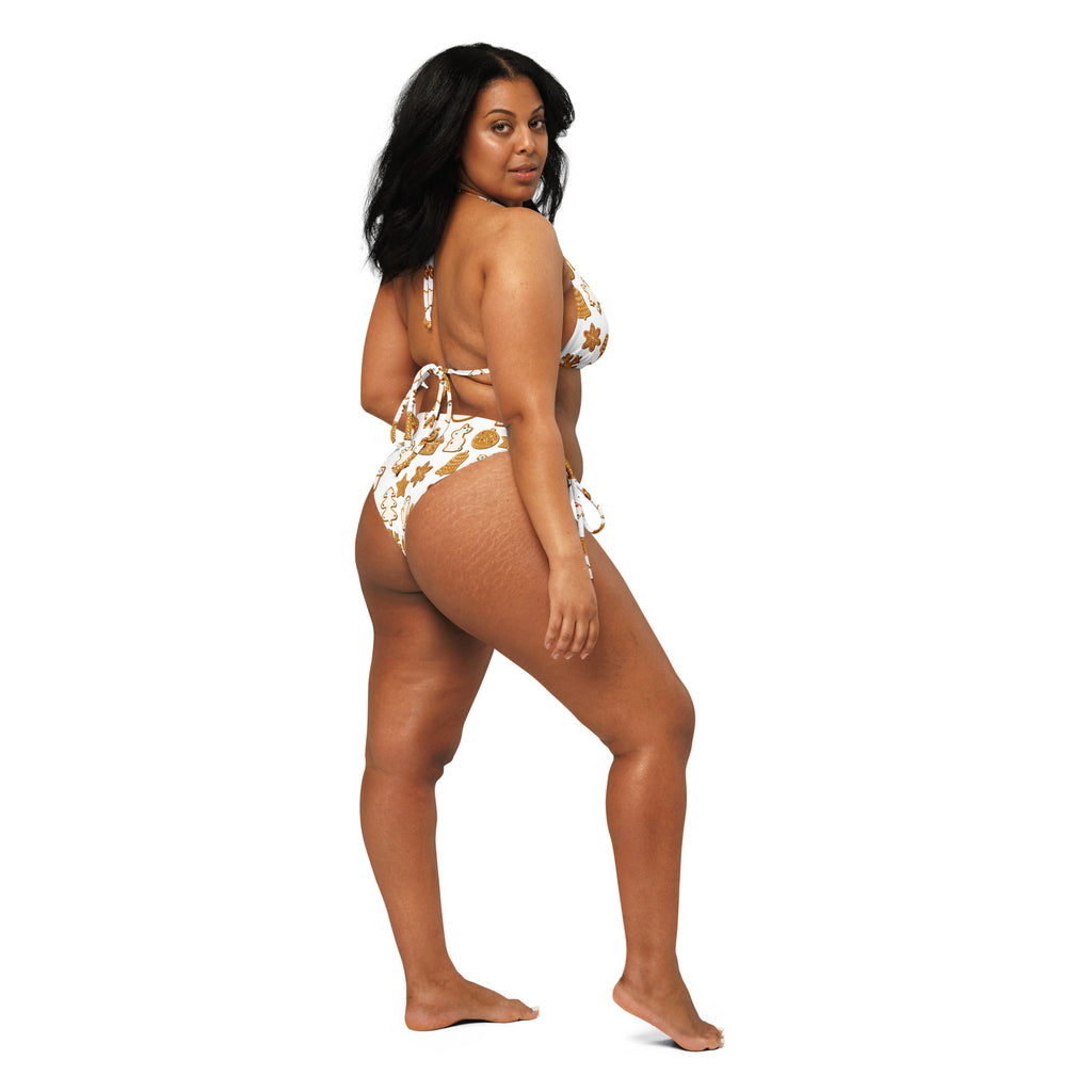 White and gold patterned two-piece recycled string bikini with tie-side design and buttery soft fabric with upf 50+