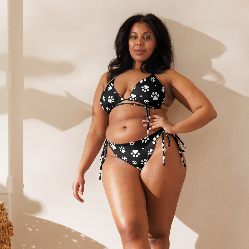 Women’s black and white paw print buttery soft recycled string bikini set with adjustable side ties and upf 50+ protection