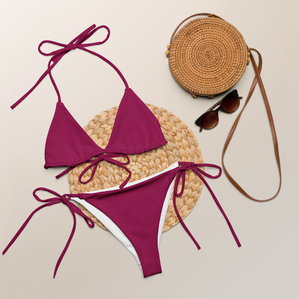 Women’s magenta purple buttery soft recycled string bikini with upf 50 plus featuring triangle top and tie-side bottoms