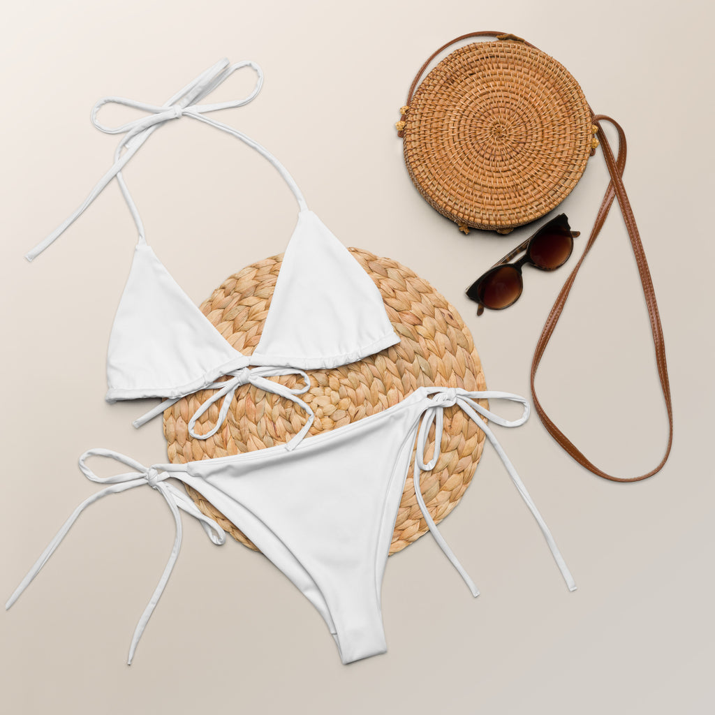 Women’s white buttery soft recycled string bikini set with adjustable tie-side straps and matching thong bottom