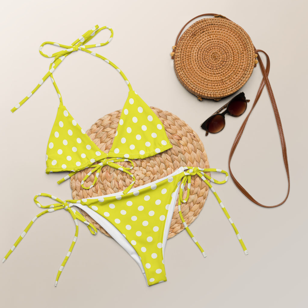 Women’s lime green and white polka dot buttery soft recycled string bikini with upf 50 and adjustable tie-side straps