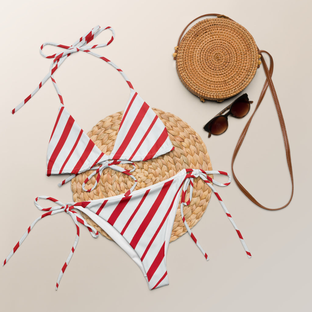 Women’s red and white striped buttery soft recycled string bikini with tied side ties and upf 50 plus protection