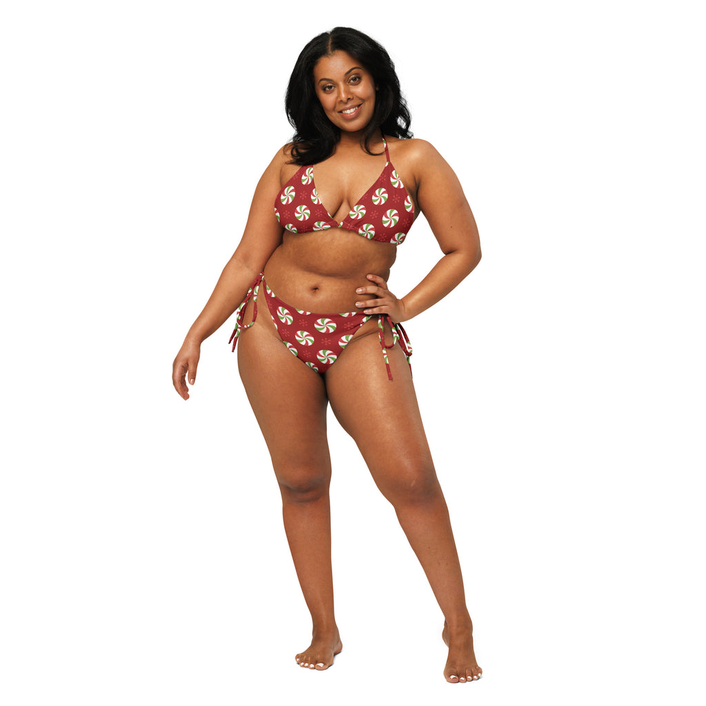 Women’s red peppermint candy buttery soft recycled string bikini with white pattern and side ties with UPF 50 plus