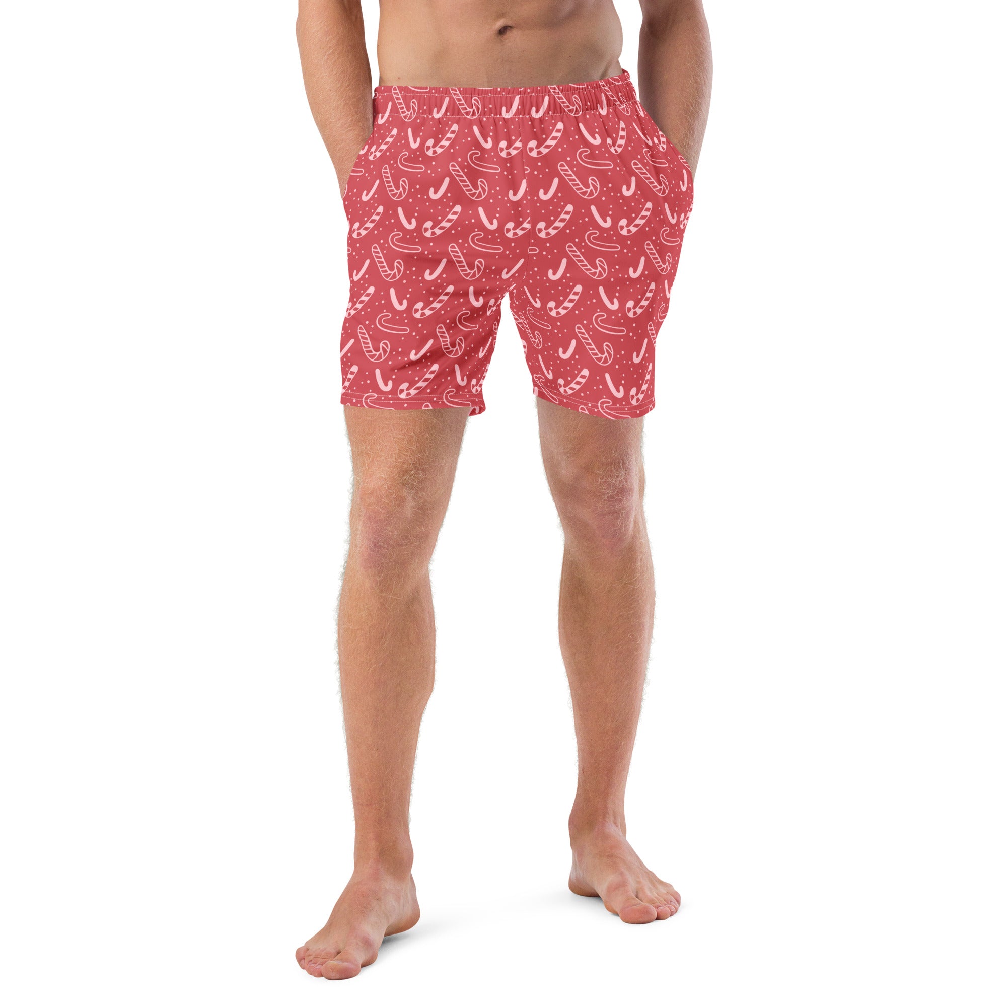 Men’s red candy cane christmas swim trunks with white candy cane pattern front view