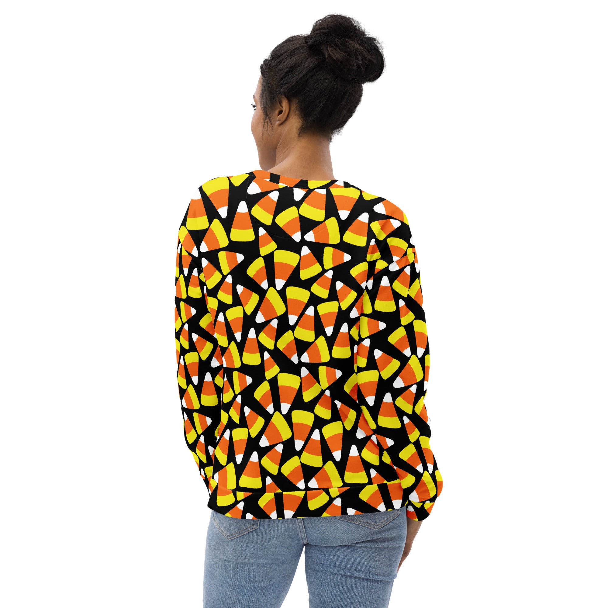A black long-sleeved candy corn halloween sweatshirt with vibrant orange yellow white pattern and brushed fleece lining