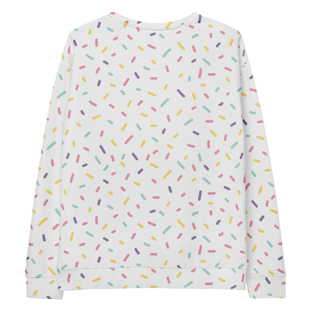 White long-sleeved sweatshirt with pastel colorful sprinkles and brushed inner fleece fabric for warmth and comfort