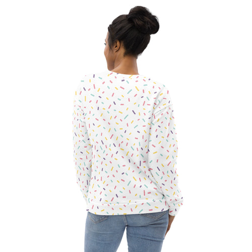 White long-sleeved sweatshirt with colorful sprinkles pattern and brushed inner fleece fabric for cozy wear