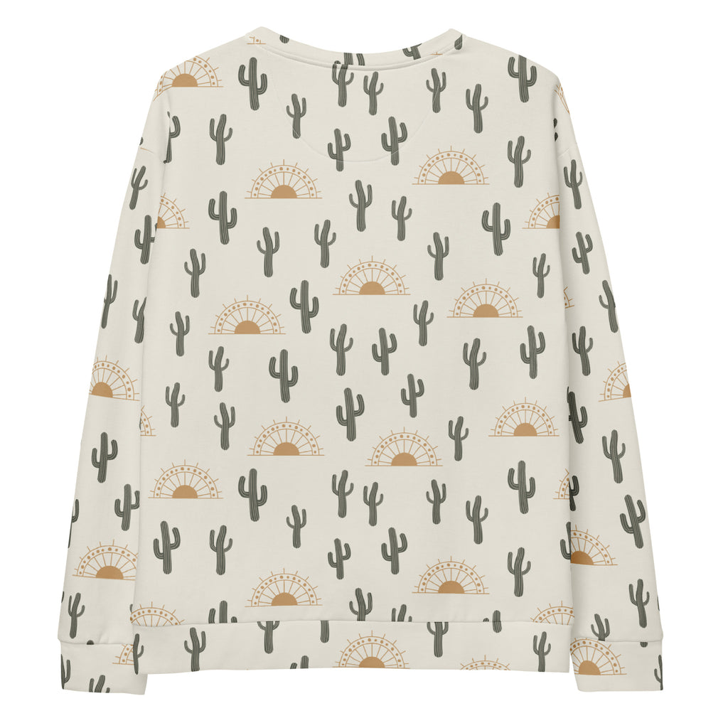 Cream-colored long-sleeved cactus desert sunrise sweatshirt with gray cactus pattern and brushed inner fleece fabric