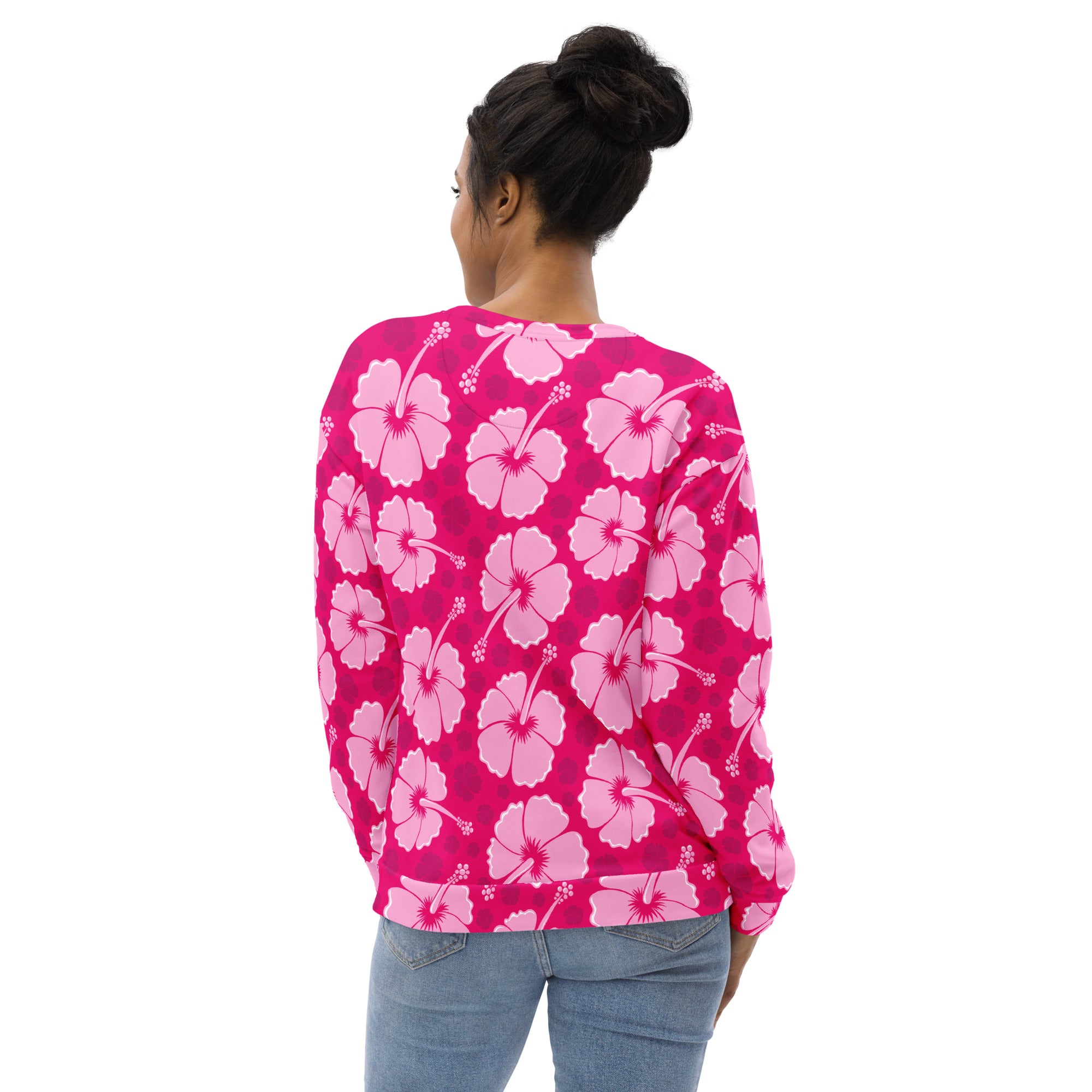 A vibrant pink long-sleeved sweatshirt with light pink hibiscus pattern and brushed inner fleece fabric