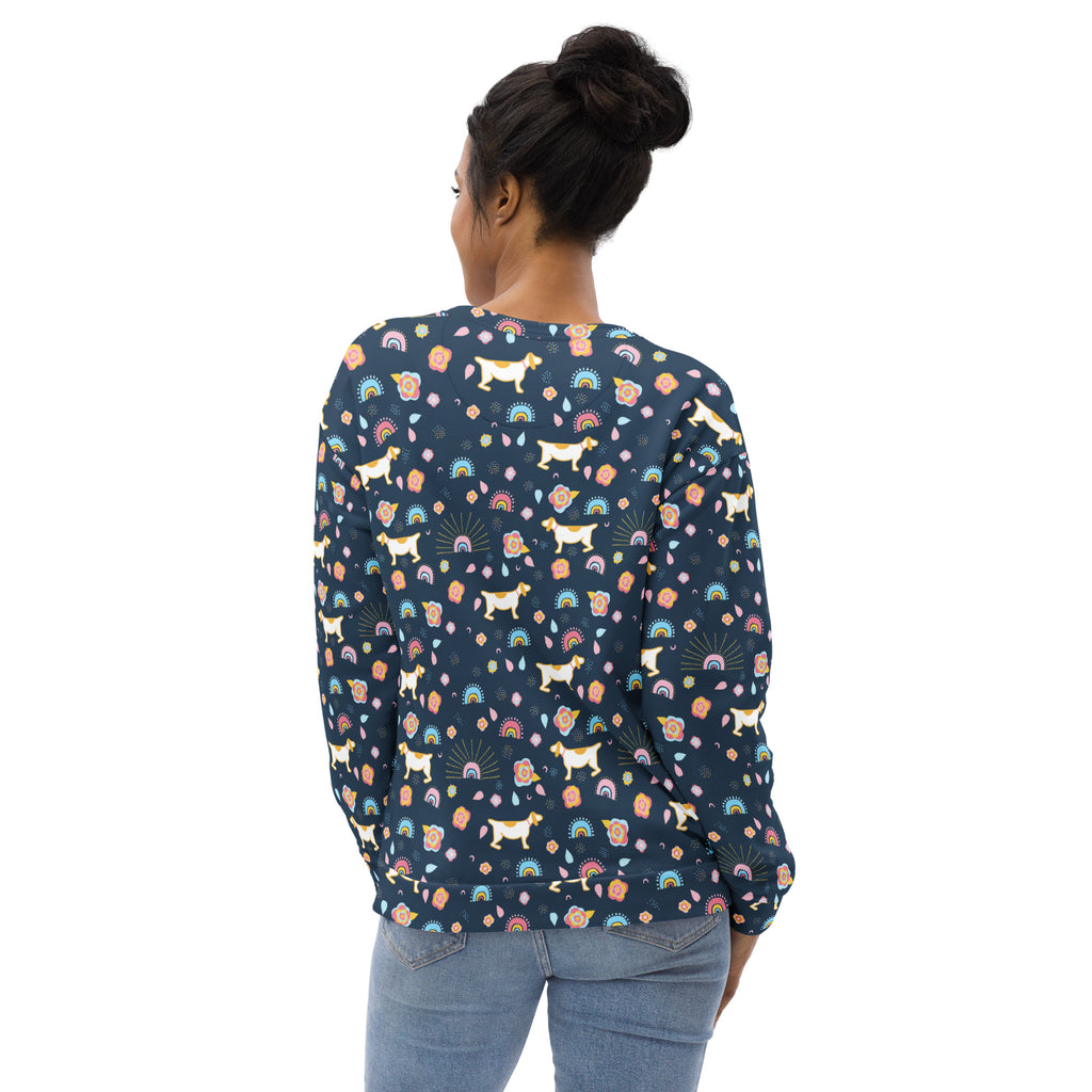 A navy blue long-sleeved sweatshirt with playful dog and rainbow patterns and brushed inner fleece fabric