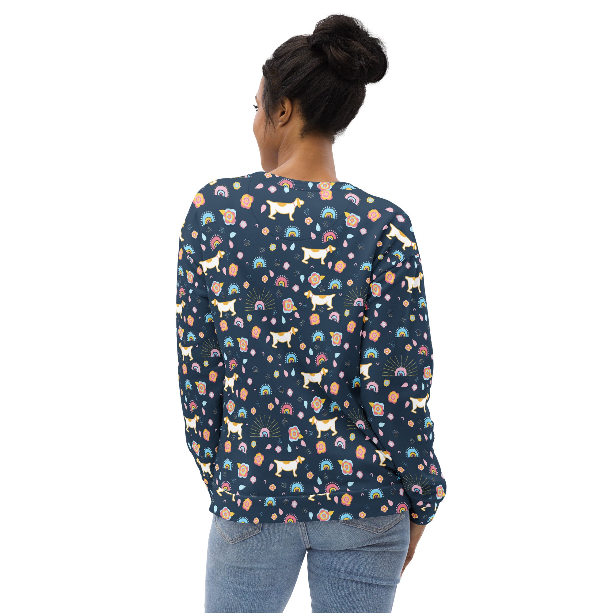 A navy blue long-sleeved sweatshirt with playful dog and rainbow patterns and brushed inner fleece fabric
