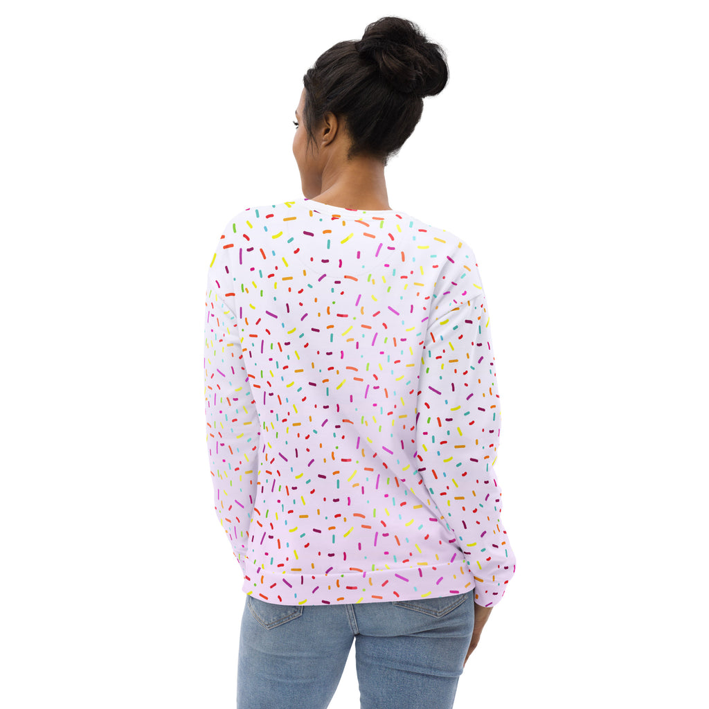 A white long-sleeved sweatshirt with multicolored sprinkles and brushed inner fleece fabric for warmth