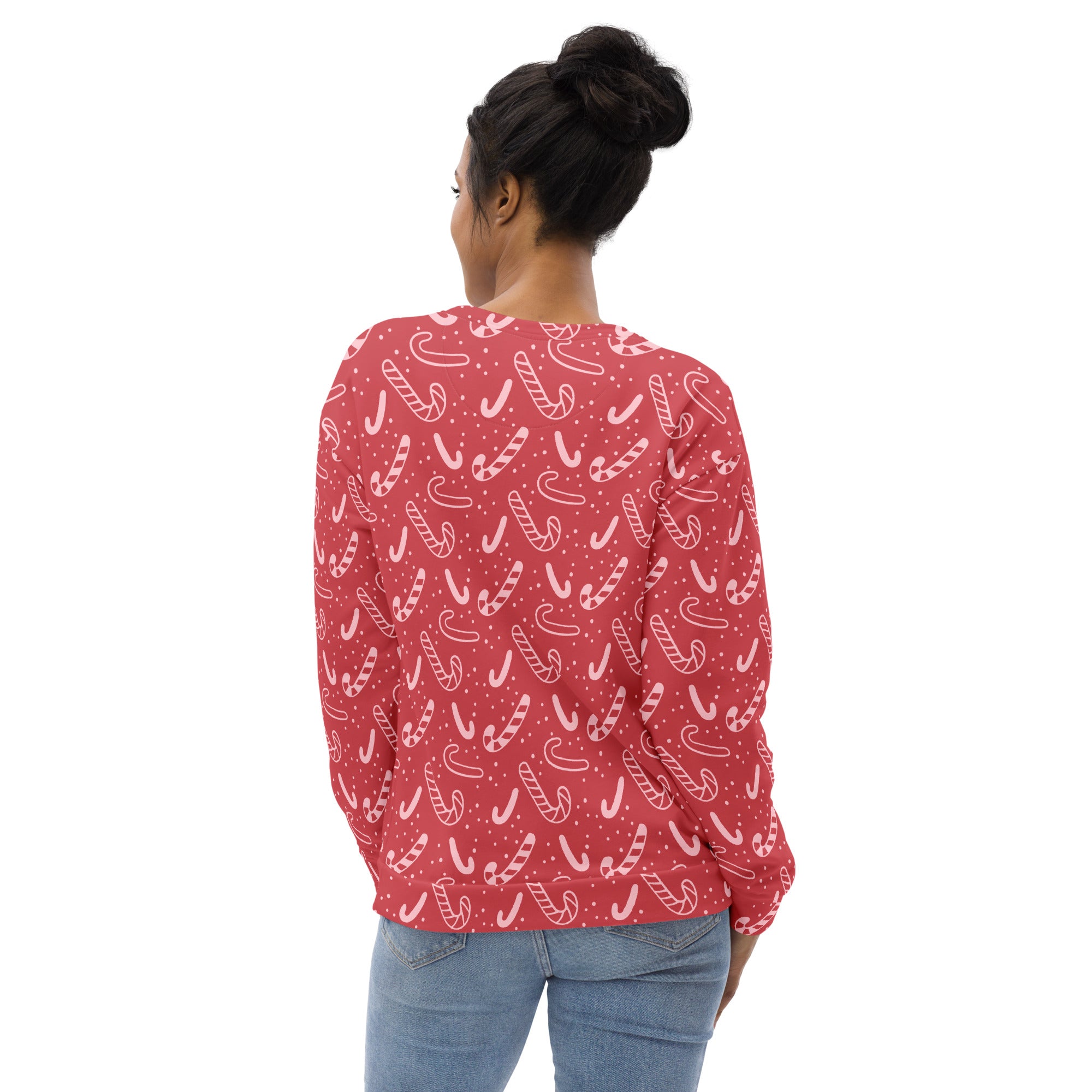 Red candy cane christmas sweatshirt with long sleeves festive pattern and brushed inner fleece fabric for warmth