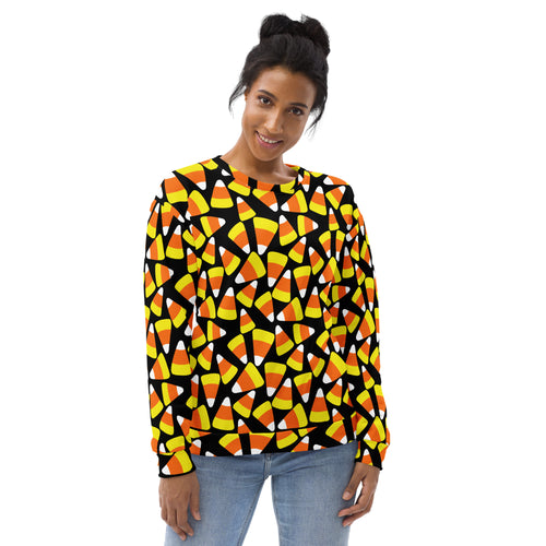 A black long-sleeved candy corn halloween sweatshirt with vibrant orange yellow white pattern and brushed fleece fabric