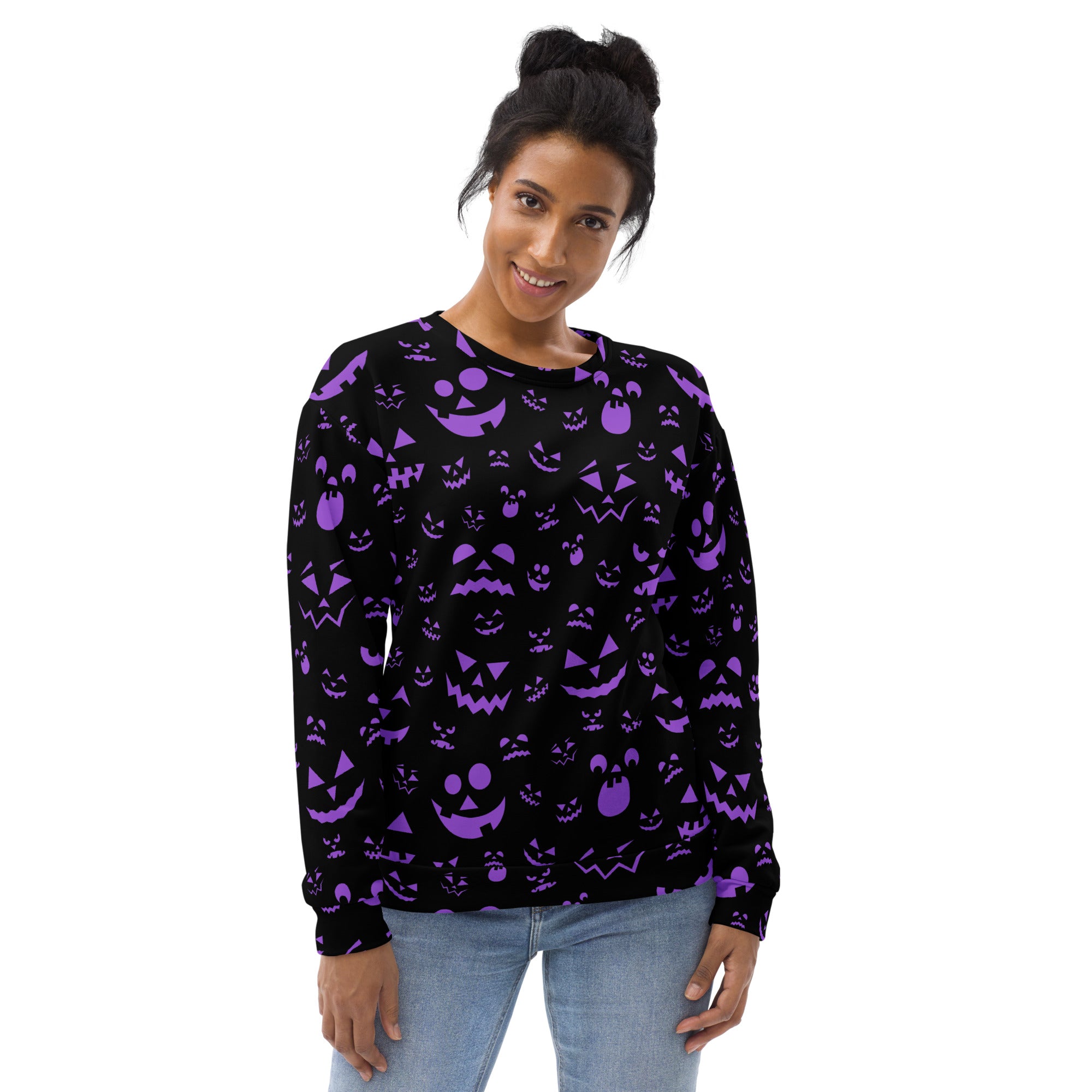 Black long-sleeved sweatshirt with vibrant purple jack-o-lantern face pattern and brushed inner fleece fabric
