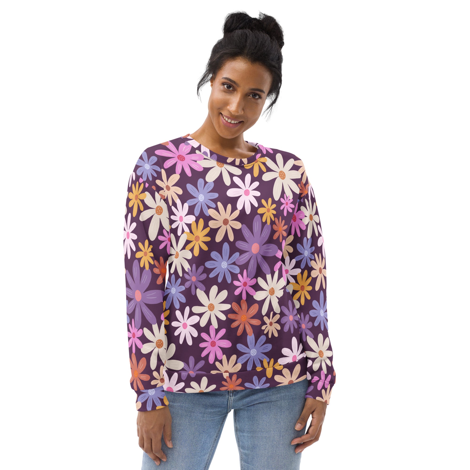 A vibrant purple floral sweatshirt with colorful daisies and brushed inner fleece for warmth and comfort