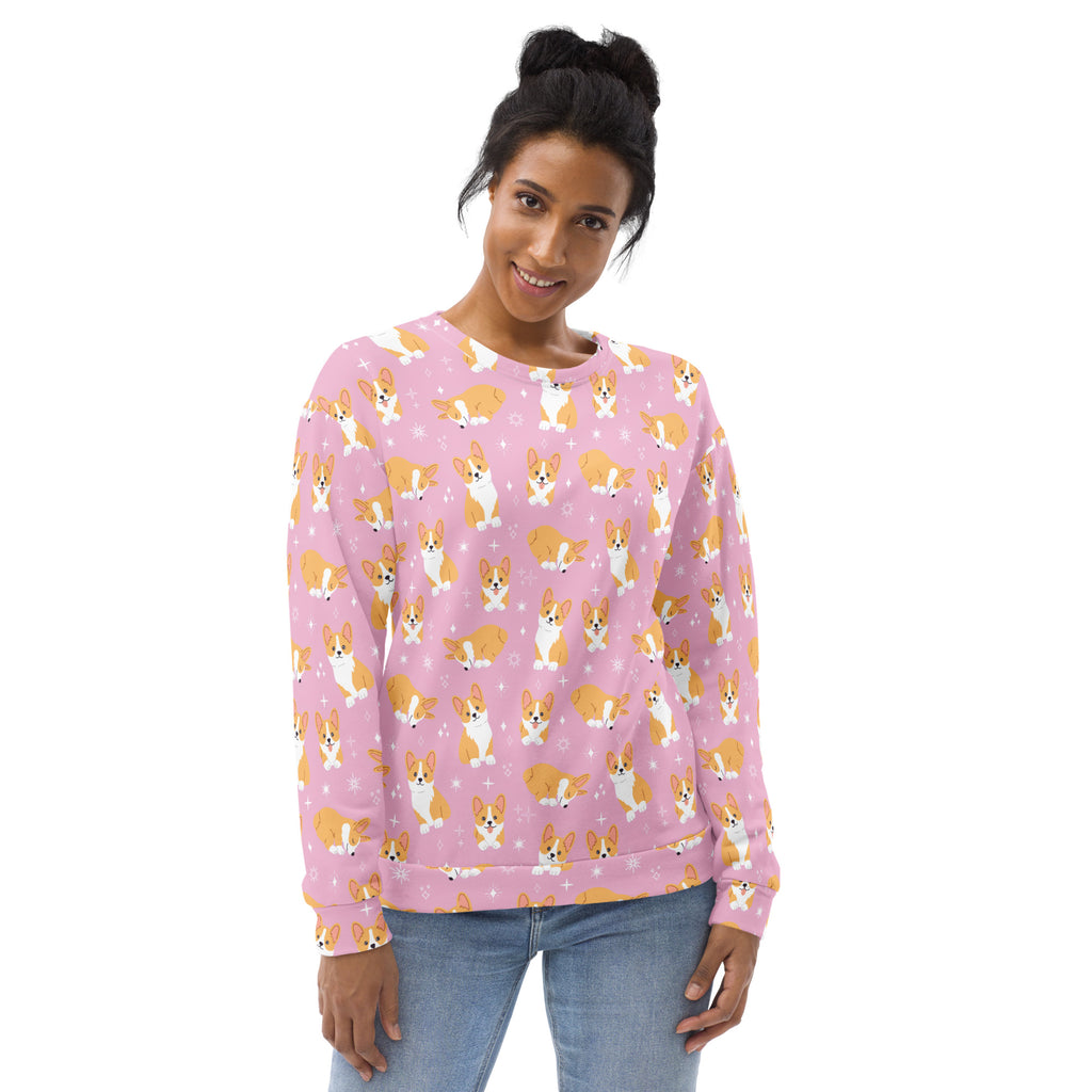 Pink corgi dog sweatshirt with brushed inner fleece fabric featuring a repeating pattern of tan and white cartoon corgis