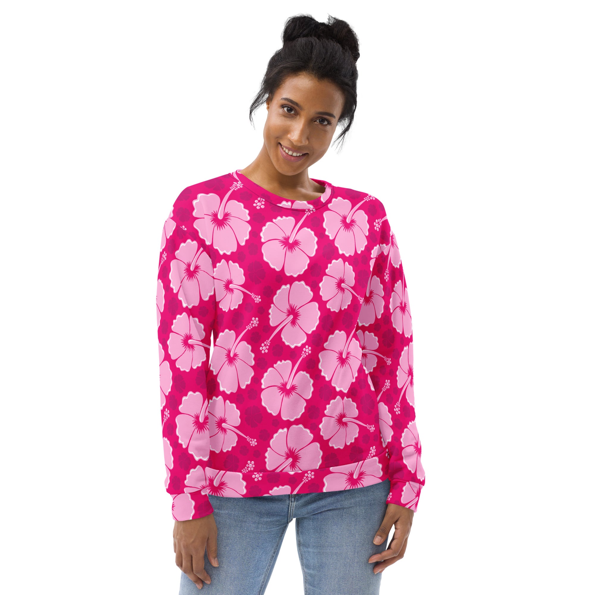 A vibrant pink long-sleeved tropical hibiscus sweatshirt with lighter pink flowers and brushed inner fleece fabric