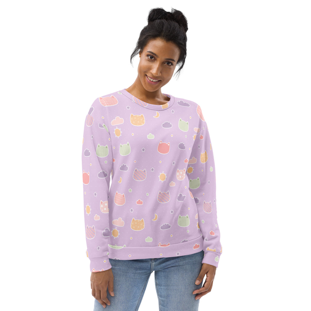 A soft lavender sweatshirt with pastel kawaii cats clouds moons pattern and brushed inner fleece fabric