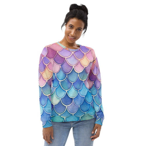 A vibrant long sleeve sweatshirt with a colorful purple pink blue teal mermaid scale gradient and brushed fleece lining