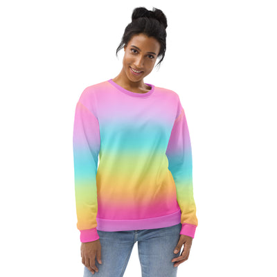 A vibrant rainbow gradient sweatshirt with soft brushed inner fleece fabric and ribbed pink cuffs