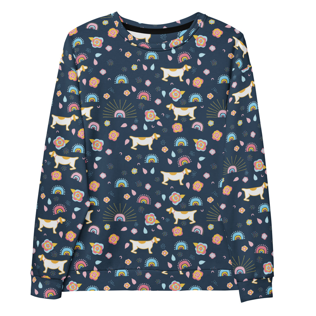 A navy blue long-sleeved sweatshirt with a playful dog and rainbow pattern and brushed inner fleece fabric