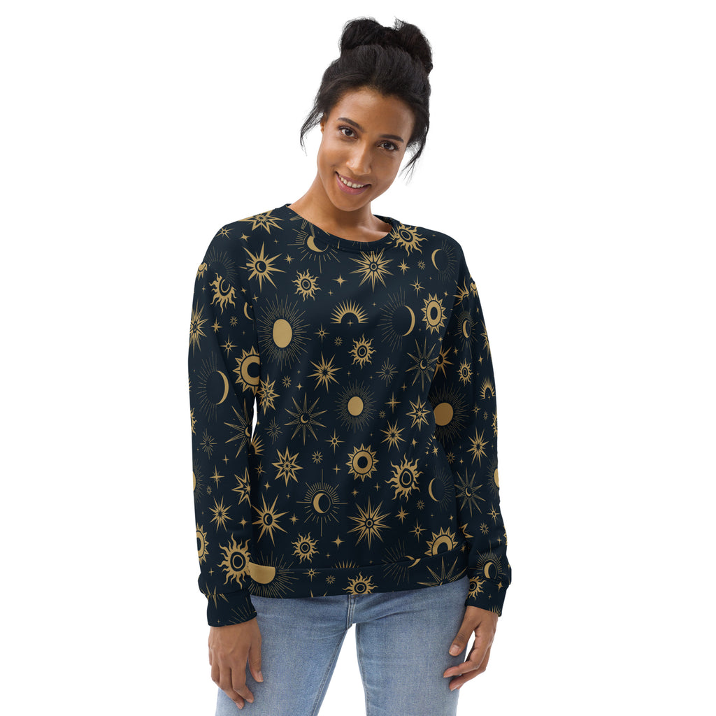 A dark navy celestial sun and moon sweatshirt with vibrant gold pattern and brushed inner fleece fabric