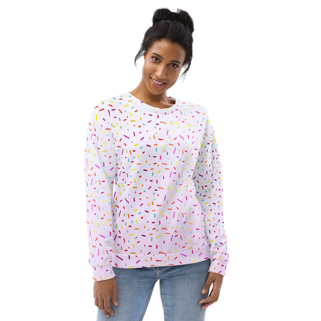 A white long-sleeved sweatshirt with multicolored sprinkles pattern and brushed inner fleece fabric