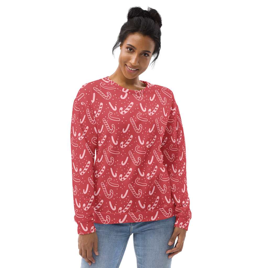 Red long-sleeved candy cane christmas sweatshirt with brushed inner fleece fabric and white candy cane pattern