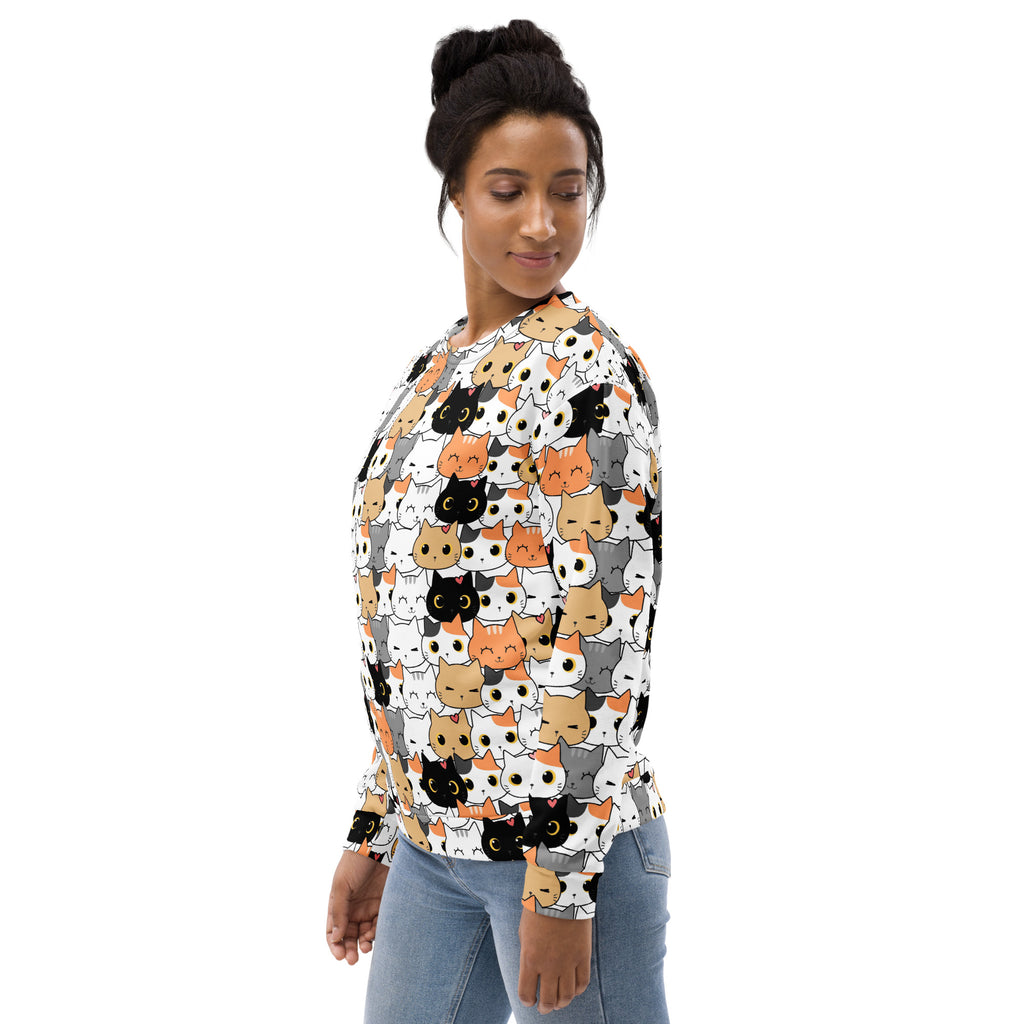 A white long-sleeved cat face sweatshirt with colorful cartoon cats and brushed inner fleece fabric