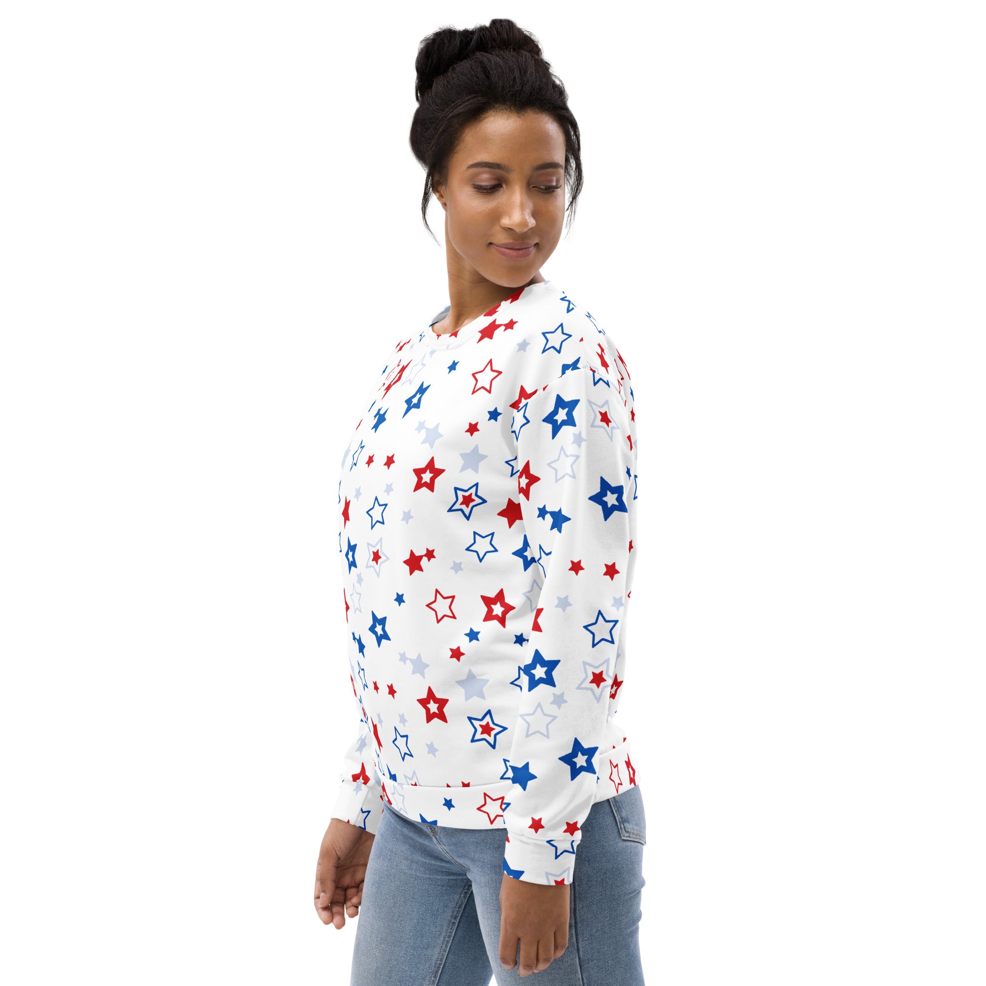White sweatshirt with playful red blue and silver stars pattern featuring brushed inner fleece fabric