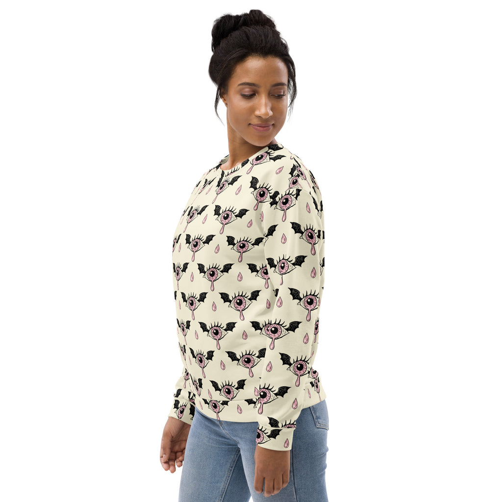 Cream-colored long-sleeved gothic eyeball halloween sweatshirt with black bats pink eyes droplets and brushed fleece fabric
