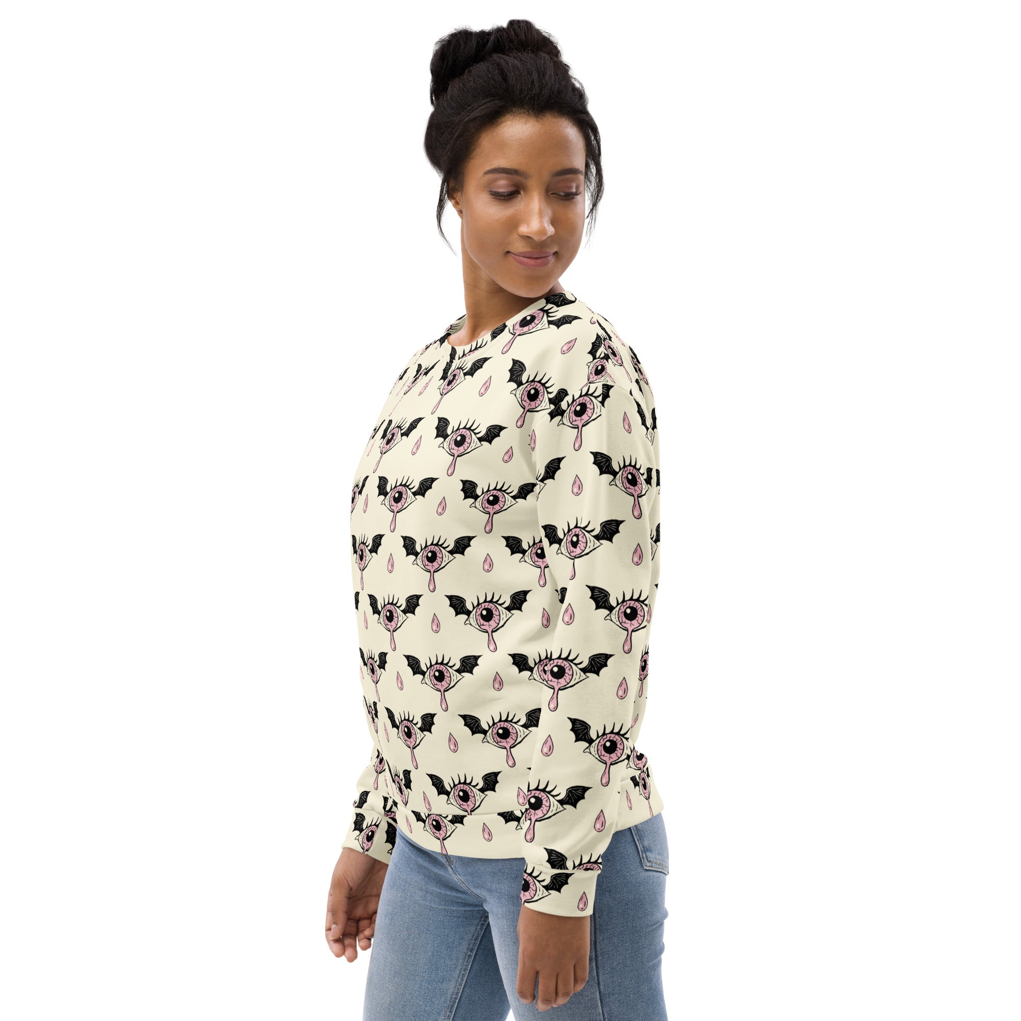 Cream-colored long-sleeved gothic eyeball halloween sweatshirt with black bats pink eyes droplets and brushed fleece fabric