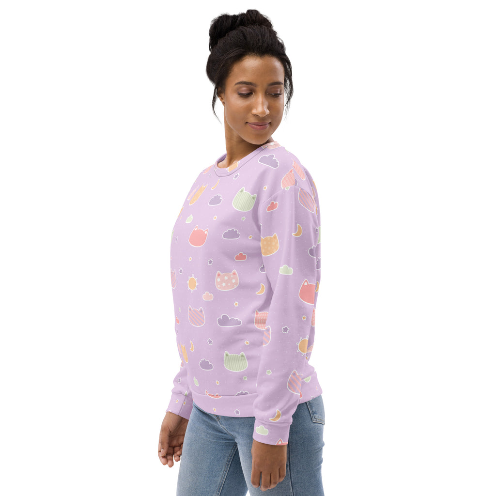 A soft lavender long-sleeved sweatshirt with pastel kawaii cats clouds moons and brushed inner fleece fabric