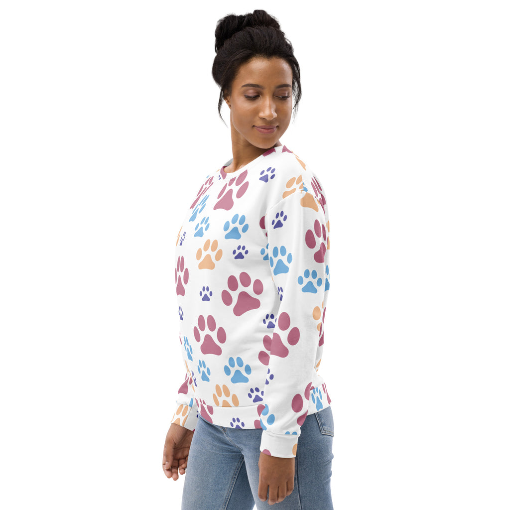 White sweatshirt with brushed inner fleece fabric featuring playful multicolored paw prints in pink blue and orange