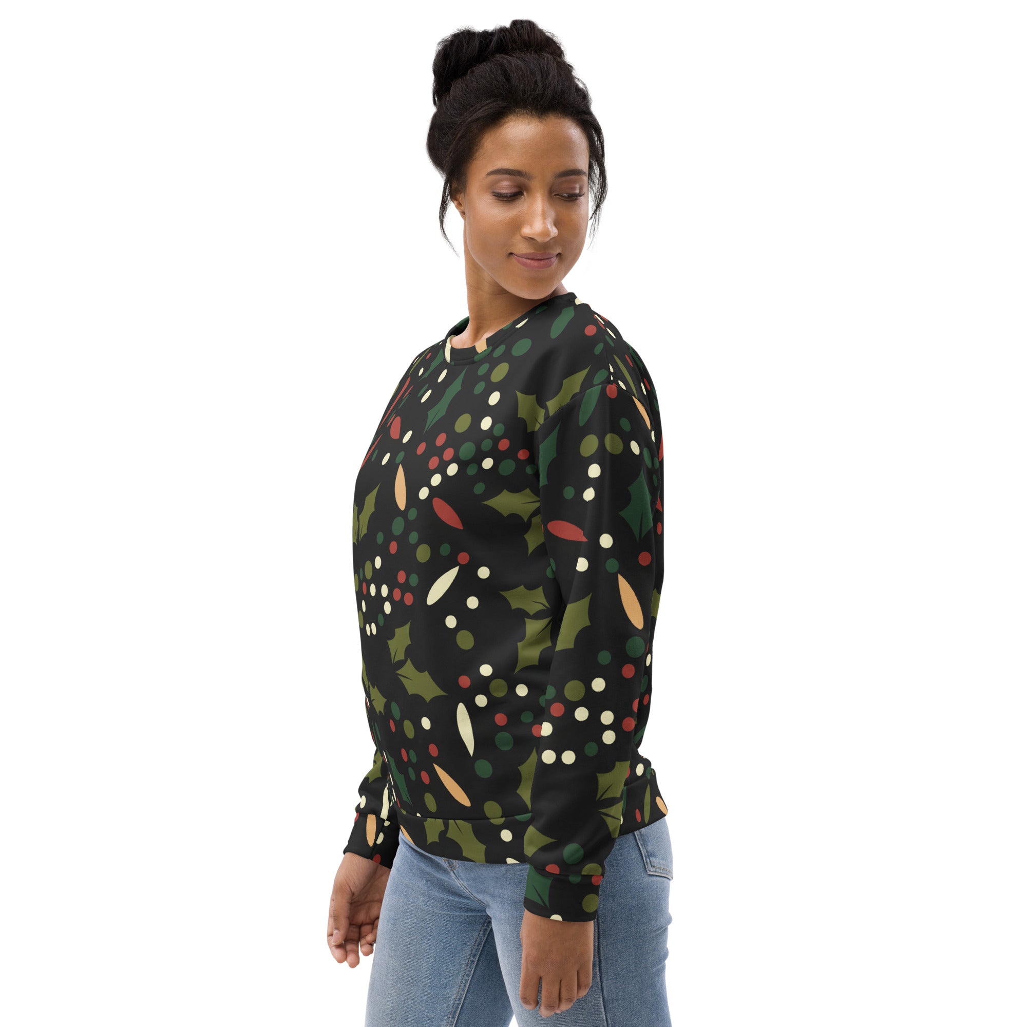 Black long-sleeved floral christmas sweatshirt with brushed inner fleece featuring holly leaves and festive dots pattern