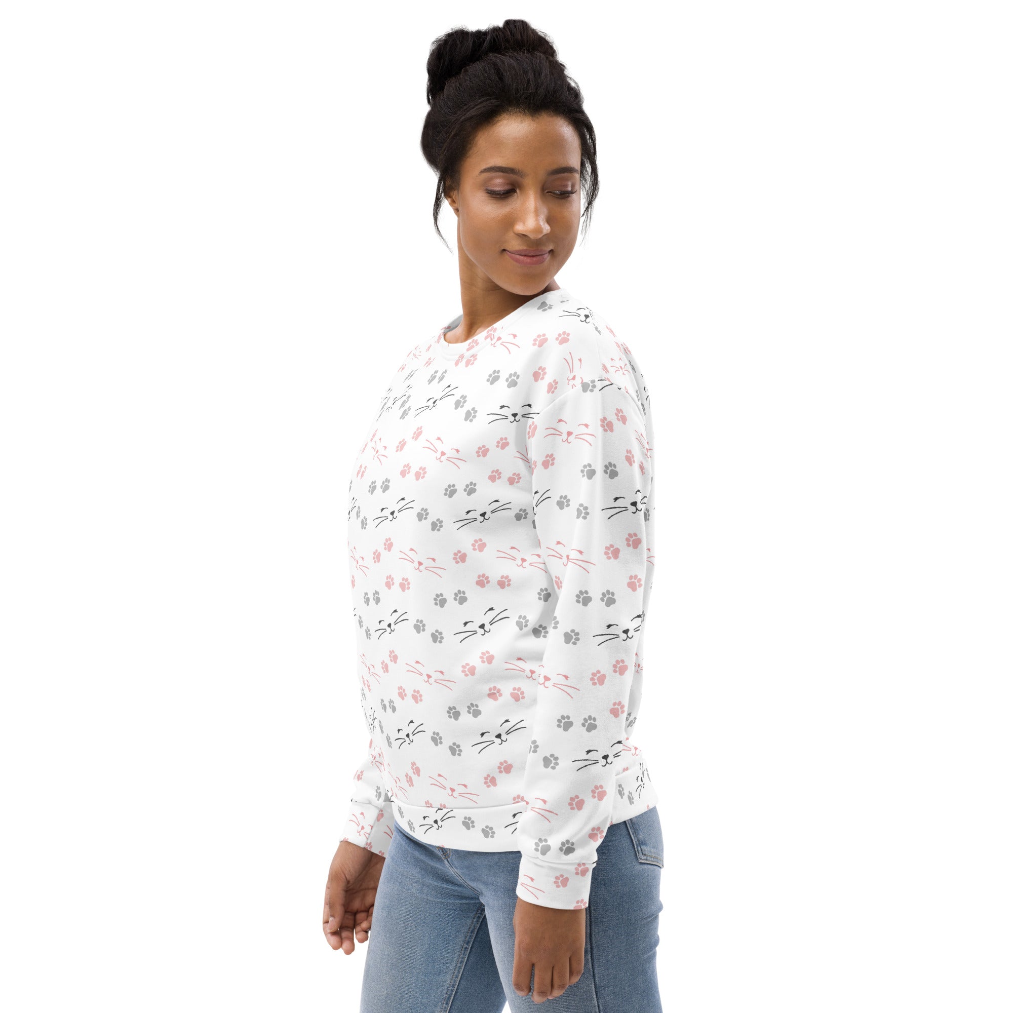 White long-sleeved sweatshirt with pink and gray cat faces paw prints and brushed inner fleece fabric
