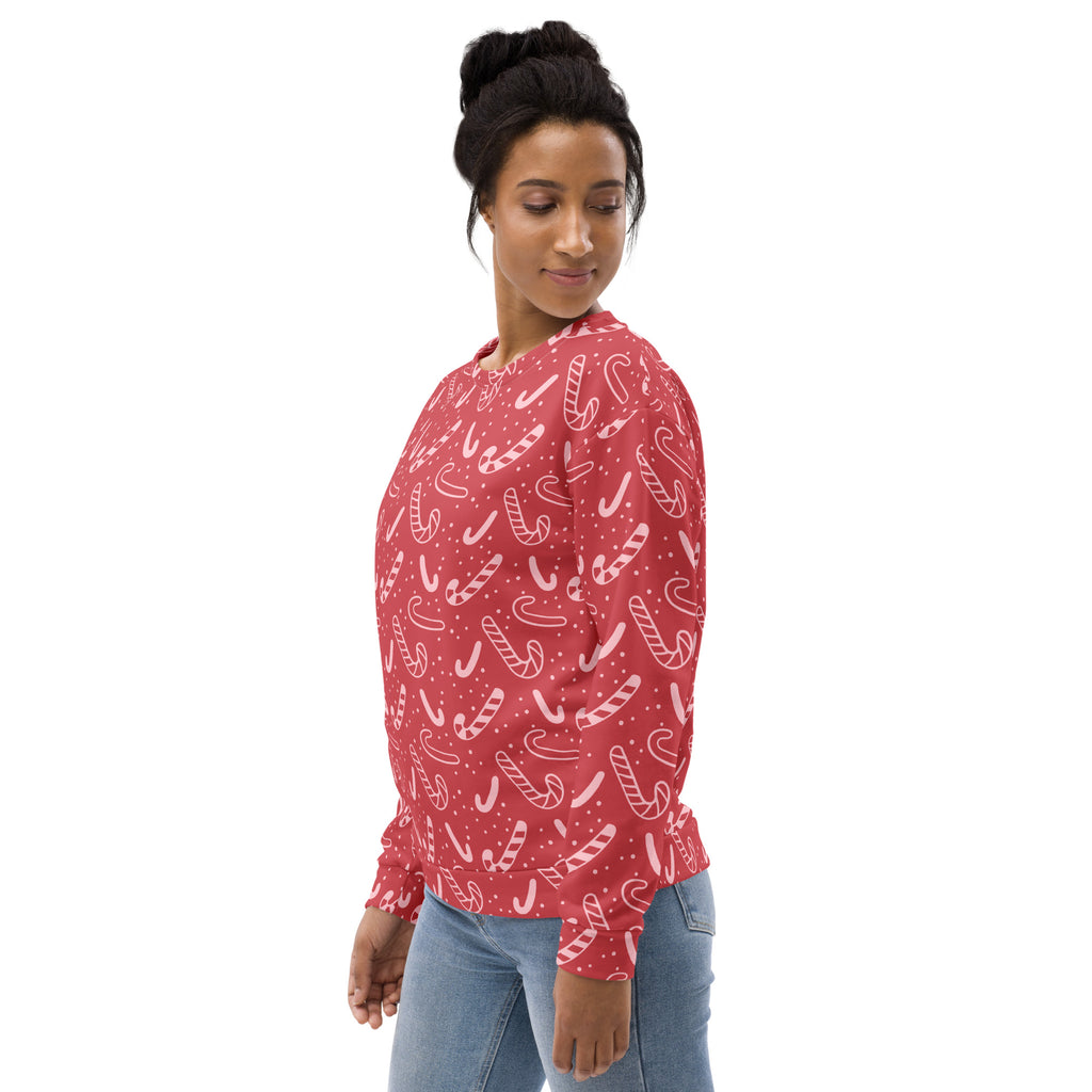 Red candy cane Christmas sweatshirt with white patterns and brushed inner fleece fabric for winter warmth