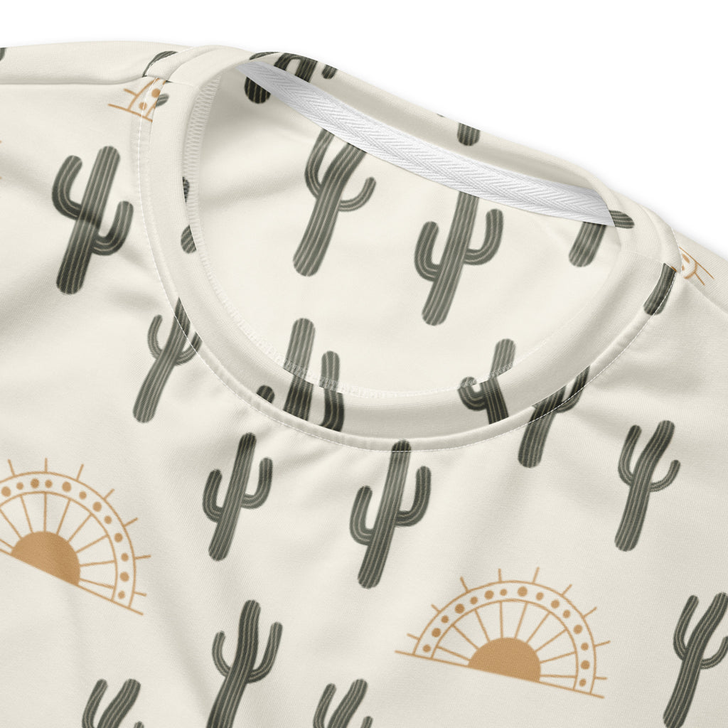 Cream-colored cactus desert sunrise sweatshirt with black cacti and tan sun pattern and brushed inner fleece fabric