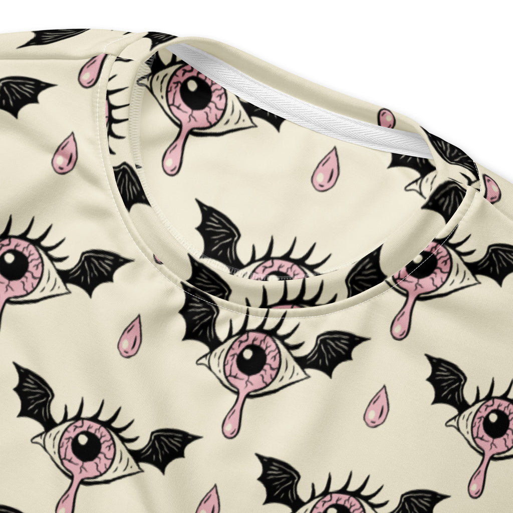 Cream-colored gothic eyeball Halloween sweatshirt with pink dripping eyes pattern and brushed inner fleece fabric