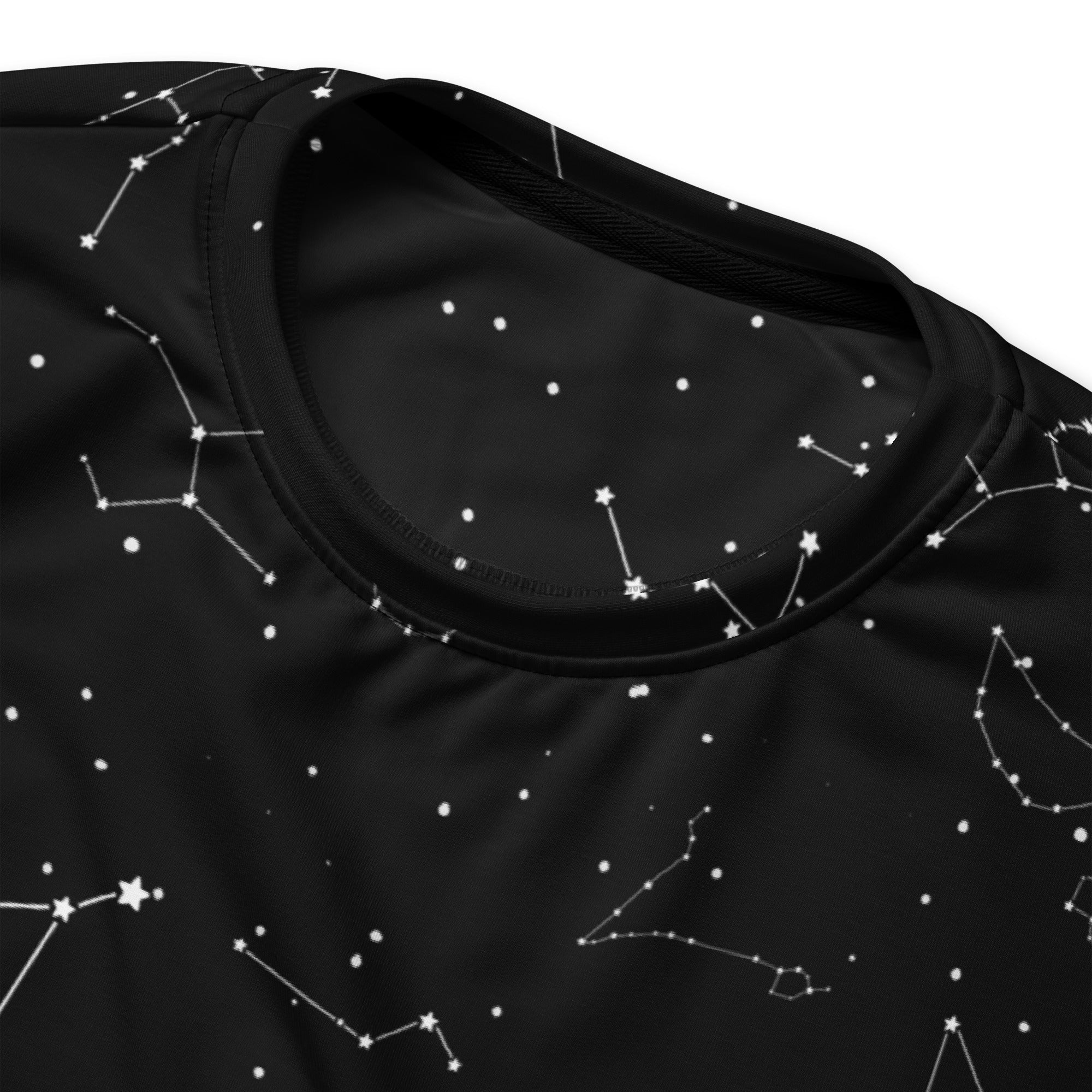 Black short-sleeved top with white star and constellation patterns featuring brushed inner fleece fabric