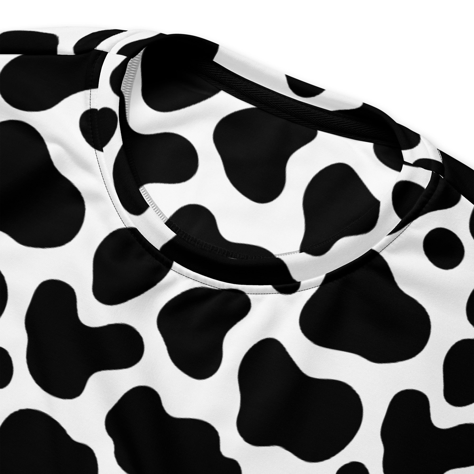 A black and white cow print sweatshirt with a round neckline and brushed inner fleece fabric for warmth