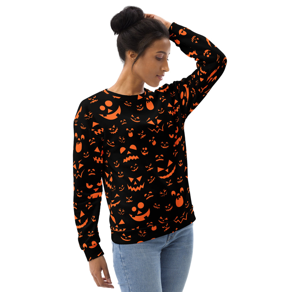 Black long-sleeved sweatshirt with orange jack-o-lantern faces and brushed inner fleece for Halloween wear